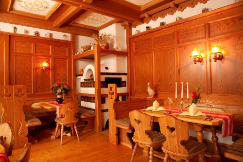 a dining room with a table and chairs at Landhotel Bayerwald in Grafling