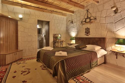 Voodi või voodid majutusasutuse Days inn Cappadocia toas