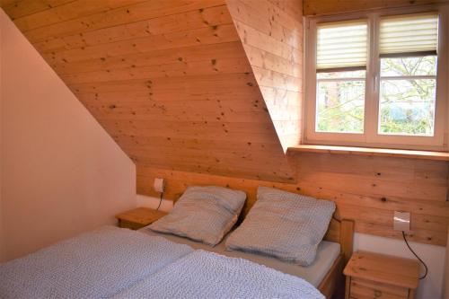 מיטה או מיטות בחדר ב-Cäcilienhof
