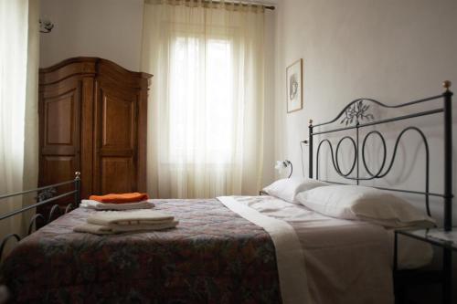 A bed or beds in a room at Villa Brizzi