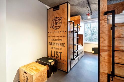 a locker room with a basketball sign on the wall at H.ostel Münster in Münster