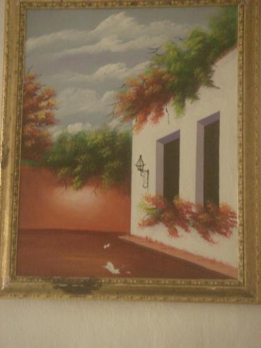 a picture of a painting of a house with trees at Dre Broeders Apartments Juan Dolio in Juan Dolio