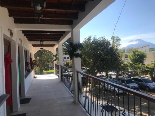 a balcony with a view of a parking lot at Hotel y Centro de Convenciones Jardines del Lago in Panajachel