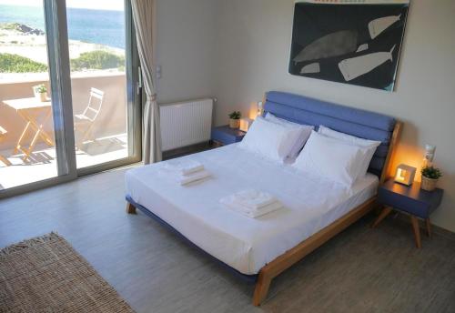 Posteľ alebo postele v izbe v ubytovaní Afrala Summerhouse