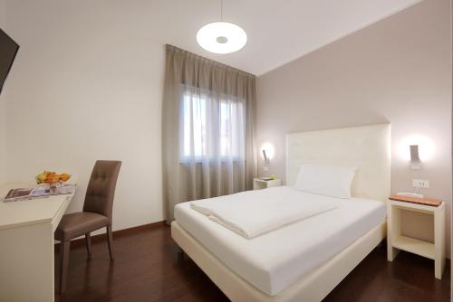 Hotel Asterixにあるベッド