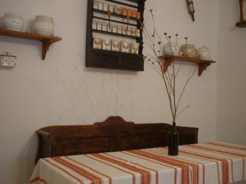 Кровать или кровати в номере Kamilla Vendégház