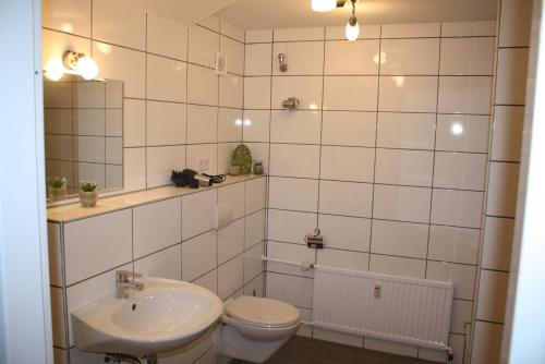 Kylpyhuone majoituspaikassa Apartments Schöneberg
