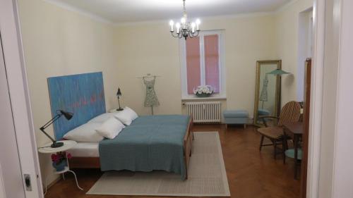 Кровать или кровати в номере Ferienwohnung Loma