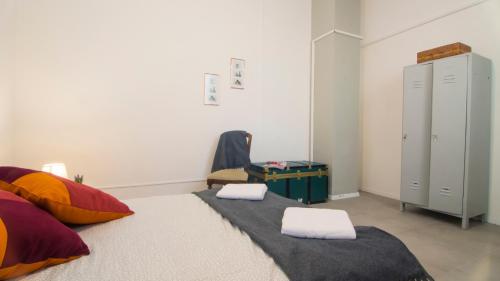 Postel nebo postele na pokoji v ubytování Hostelleria