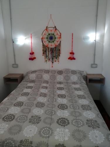 Un pat sau paturi într-o cameră la El Vagón