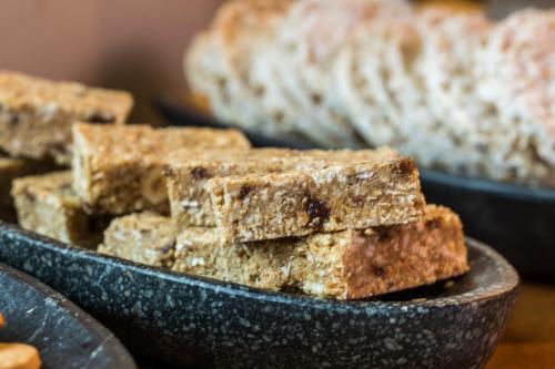 a pile of slices of bread in a bowl at Delfines Hotel & Convention Center in Lima