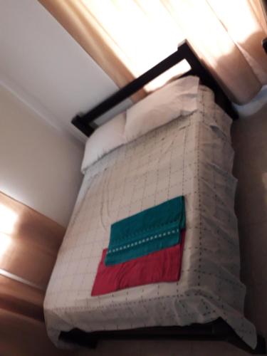 a pillow hanging from a ceiling in a room at Finca la Miradita in Cumaral