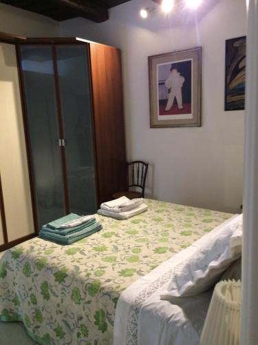 Giường trong phòng chung tại Antico Vicolo