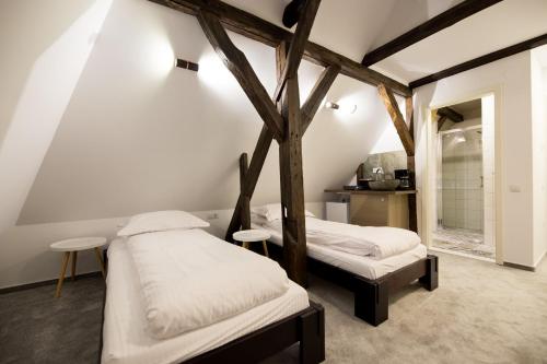 Postel nebo postele na pokoji v ubytování FRIEDRICH HOMM