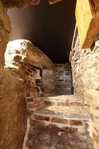 an old brick hallway in a stone building at Hotel Regent Tallinn in Tallinn