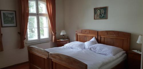 Ένα ή περισσότερα κρεβάτια σε δωμάτιο στο Villa Kliche