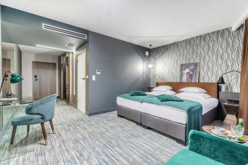 Posteľ alebo postele v izbe v ubytovaní Hotel Traugutta3