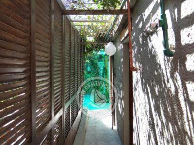 an empty hallway of a house with a pool at El cuento del gainford in Aguas Dulces