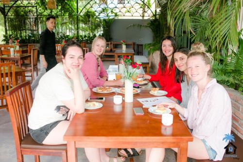 Gæster der bor på Cottage Village