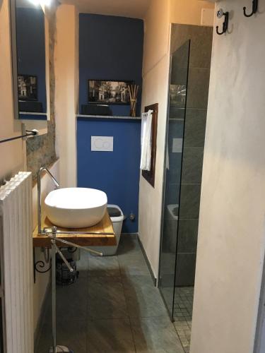 a bathroom with a sink and a shower at Baita Sorriso in Brunate