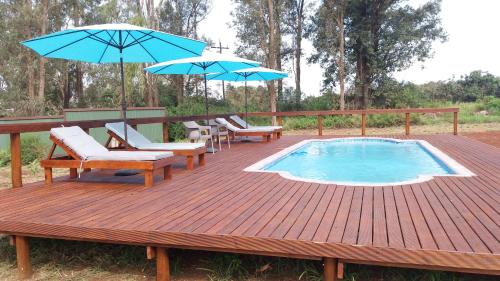 Piscina a Hluhluwe Country cottages o a prop