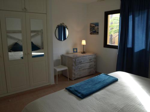 Cama o camas de una habitación en Appartamento in Oasis tropicale