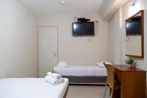 Postel nebo postele na pokoji v ubytování Motel Aviv