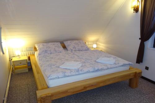 Postel nebo postele na pokoji v ubytování Apartmány Modus 2