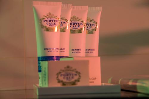 a stack of pink toilet paper on a shelf at HOTEL JAVIER MONTERO in Ribadeo