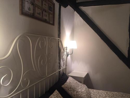 Cama o camas de una habitación en Apartamentos El Greco