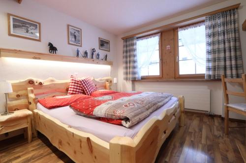 Cama o camas de una habitación en B&B Stiffler-Huus