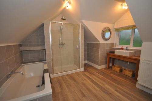 a bathroom with a shower and a sink at Seascape in Croyde