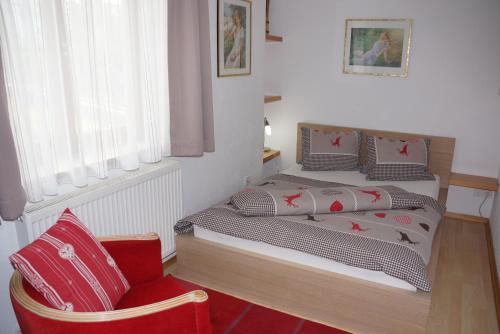 Postel nebo postele na pokoji v ubytování Haus Juen