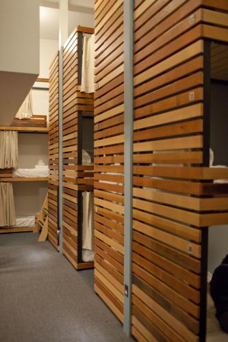 a room with wooden walls and a closet at The Society Hotel in Portland
