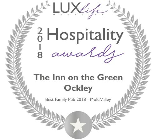 a laurel wreath wreath reunion invitation with a laurel wreathreath at The Inn On The Green in Ockley