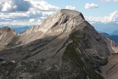 a view of a large mountain with clouds in the sky at Ansitz Jenner in Appiano sulla Strada del Vino