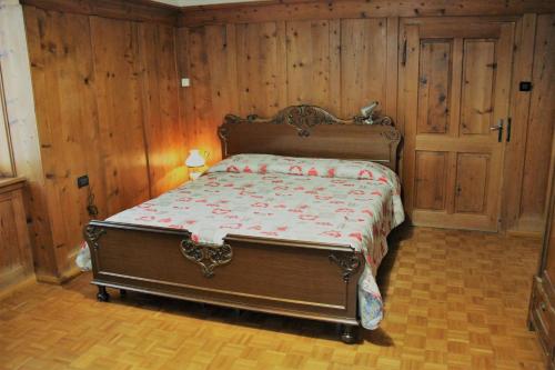 Postel nebo postele na pokoji v ubytování Da Rinota in Alta Val di Non