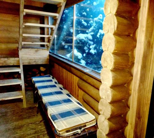 Двухъярусная кровать или двухъярусные кровати в номере Ресторанно-гостинничный комплекс Боярский двор
