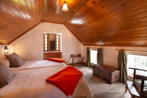 En eller flere senge i et værelse på Valle Paraizo