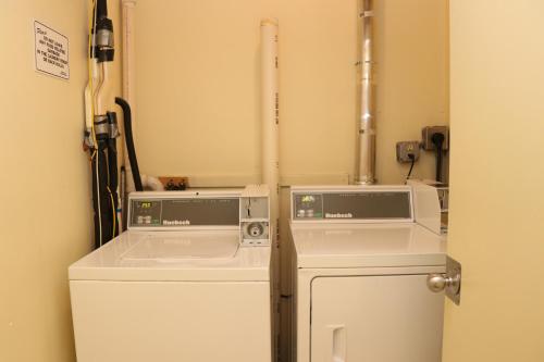 a room with a washer and dryer in a room at Downtown Boston Studio, #36 in Boston