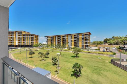 an aerial view of a park with trees and buildings at Darwin Waterfront Short Stay Apartments in Darwin