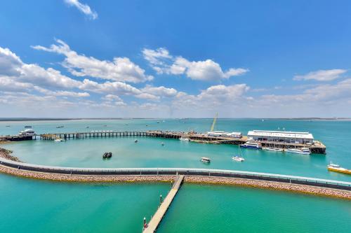 an aerial view of a marina with boats in the water at Darwin Waterfront Short Stay Apartments in Darwin