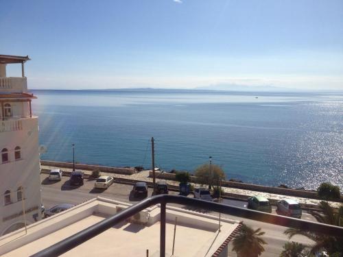 a view of the ocean from the balcony of a building at Yria Hotel in Zakynthos Town