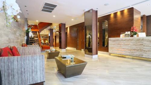 The lobby or reception area at On 8 Sukhumvit Nana Bangkok by Compass Hospitality