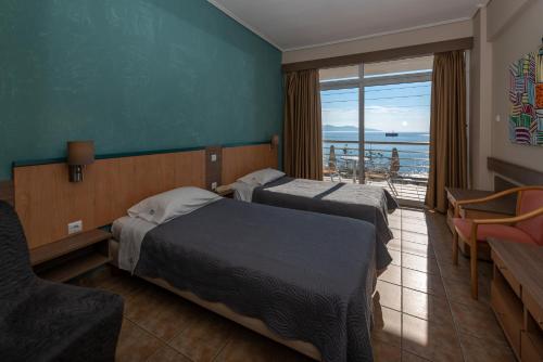Postel nebo postele na pokoji v ubytování Hotel Ostria