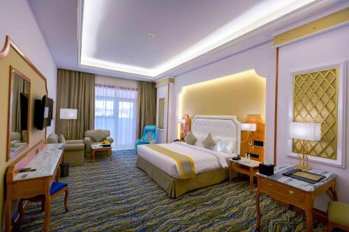 Katil atau katil-katil dalam bilik di Iridium Hotel