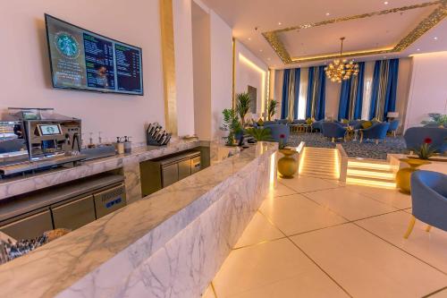 Televisyen dan/atau pusat hiburan di Iridium Hotel