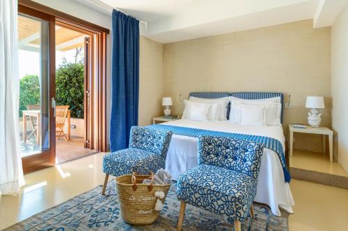 Ліжко або ліжка в номері Le Capase Resort Salento