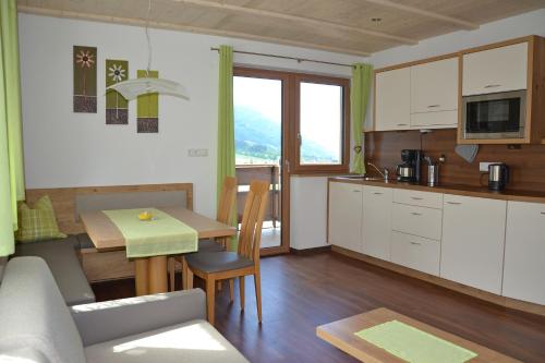 A kitchen or kitchenette at Residence Apartment Talblick