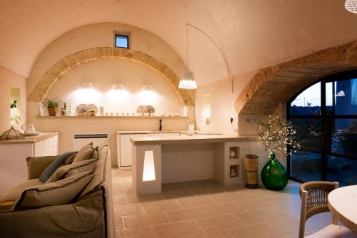 A seating area at Dimora Sighé, exclusive rural villa with hydromassage pool